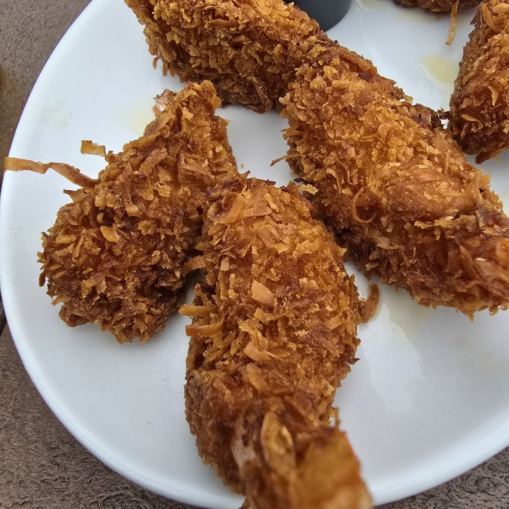Coconuts On The Beach - Coconut Crusted Shrimp - Bars Near Me - Cocoa Beach, Florida Coconuts On The Beach - Coconut Crusted Shrimp - Bars Near Me - Cocoa Beach, Florida