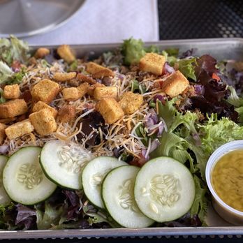 Black Barley Kitchen & Taphouse - Salad with shredded chicken and lemon vinaigrette dressing. - Pubs Near Me - Kathleen, Georgia Black Barley Kitchen & Taphouse - Salad with shredded chicken and lemon vinaigrette dressing. - Pubs Near Me - Kathleen, Georgia