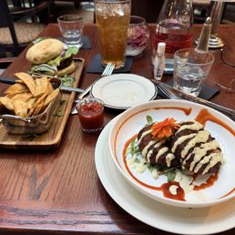 Cheeseburger, fries and crabcakes. Cheeseburger, fries and crabcakes.