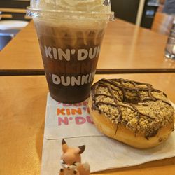 Dunkin' Donuts - Nutella donut and cold brew with whipped cream