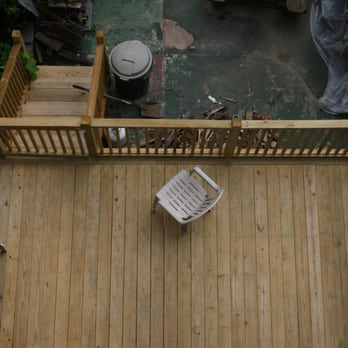 Shamrockin Painting and Contracting - We ripped out an old covered porch and added this deck made from treated wood to the back of a brownstone. - Painters Near Me - Brooklyn, New York Shamrockin Painting and Contracting - We ripped out an old covered porch and added this deck made from treated wood to the back of a brownstone. - Painters Near Me - Brooklyn, New York