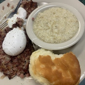 Clary's Cafe - Corned beef hash Eggs Benedict with grits and a biscuit - Breakfast & Brunch Near Me - Savannah, Georgia
