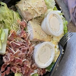 Spoons - Soups, Salads & Sandwiches - Fort Collins - This is a Caesar salad with salmon! Look how gross the salmon looks - it looks like chicken and it is still frozen inside. Disgusting.