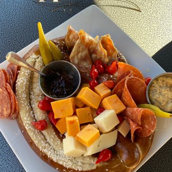 Notions - A Pretzel Charcuterie Plater with diff ent cheeses, meats, and picked vegetables. - Tapas/Small Plates Near Me - Hickory, North Carolina Notions - A Pretzel Charcuterie Plater with diff ent cheeses, meats, and picked vegetables. - Tapas/Small Plates Near Me - Hickory, North Carolina