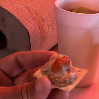 The Boiling Pot - That's right, oyster on a cracker with Tabasco, lemon and ketchup, so so good... - Seafood Near Me - Rockport, Texas