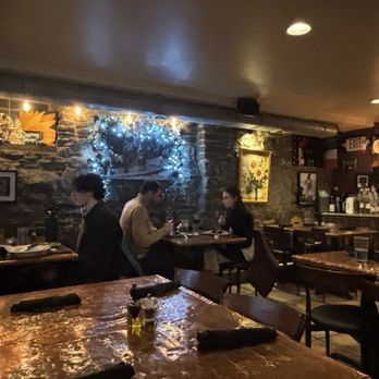 Girasole Restaurant - Copper top tables. Stone wall. - Italian Near Me - Pittsburgh, Pennsylvania Girasole Restaurant - Copper top tables. Stone wall. - Italian Near Me - Pittsburgh, Pennsylvania