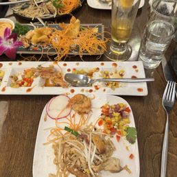 Midway through a giant feast of pad Thai, Rangoon's, and mango shrimp. Midway through a giant feast of pad Thai, Rangoon's, and mango shrimp.