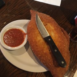 A Romas Restaurant & Pizzeria - Panzarotti big as your head!