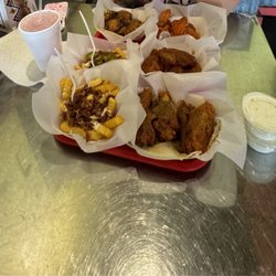 Wild Over Wings - Spicy lemon pepper, Cajun, and wow hot wings! Regular. Loaded Fries 10 Wings Combo