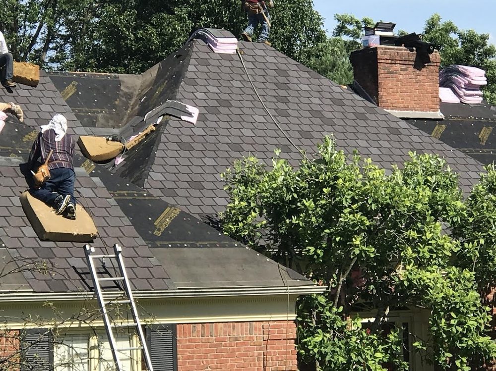 Slide of Lens Reroofing and Repairs