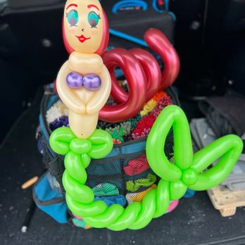 Neverland Balloons and Facepainting - Mermaid balloon animal - Face Painting Near Me Neverland Balloons and Facepainting - Mermaid balloon animal - Face Painting Near Me