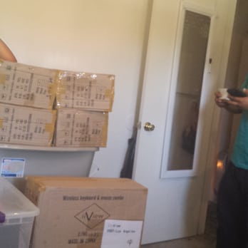 Clutter Storage - He's barcoding for my online database, so I can have only the boxes I need delivered later. I absolutely LOVE this company - Self Storage Near Me