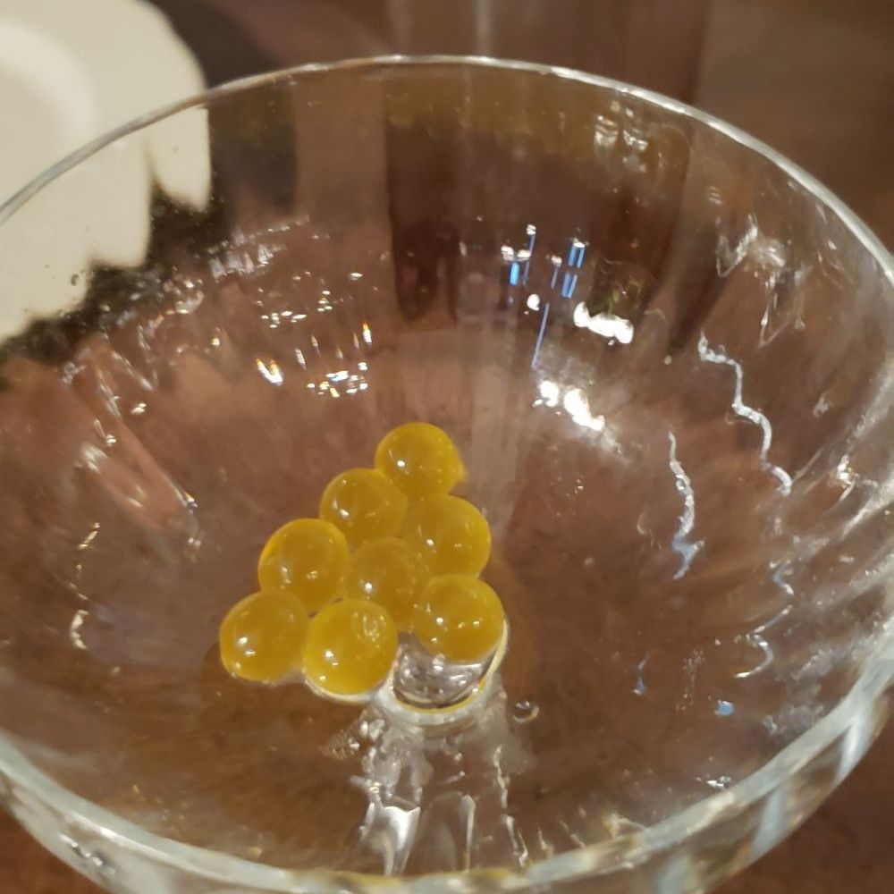 Mr Paul's Supper Club - Passion fruit Boba pearls in martini - Steakhouses Near Me - Edina, Minnesota