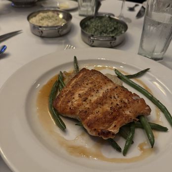 The Capital Grille - Seared Salmon with Mediterranean Couscous, Asparagus, and Heirloom Tomatoes - Steakhouses Near Me - Miami, Florida The Capital Grille - Seared Salmon with Mediterranean Couscous, Asparagus, and Heirloom Tomatoes - Steakhouses Near Me - Miami, Florida