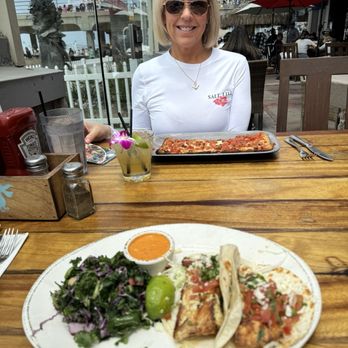 Sandy's Beach Shack - Fish tacos and my lovely wife with the flatbread brochette! And a refreshing adult beverage! I love their iced tea. - Cocktail Bars Near Me - Huntington Beach, California Sandy's Beach Shack - Fish tacos and my lovely wife with the flatbread brochette! And a refreshing adult beverage! I love their iced tea. - Cocktail Bars Near Me - Huntington Beach, California