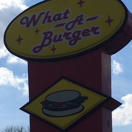 a sign for a burger restaurant a sign for a burger restaurant