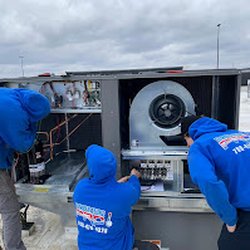 TemperaturePro Heating, Cooling & Indoor Air Quality - New package unit going in. Everyone working together to get the job done asap.