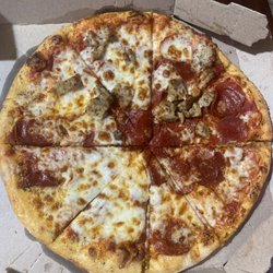 Domino's Pizza - We ordered a pepperoni and sausage pizza, and this is what we picked up. I want to know, was the person who made this pizza drunk?