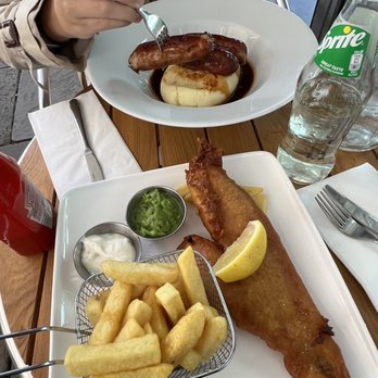 Byward Kitchen & Bar - Fish and chips low and bangers and mashed potatoes up top. - British Near Me - London, XGL Byward Kitchen & Bar - Fish and chips low and bangers and mashed potatoes up top. - British Near Me - London, XGL