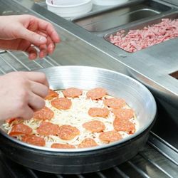 Hungry Howie's Pizza - Choose from 8 mouthwatering crust flavors: Butter, Butter Cheese, Asiago Cheese, Ranch, Onion, Cajun, Sesame and Garlic Herb
