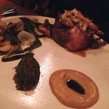Husk - Bear Creek Farm pork, grilled allium, mushrooms, ramp sauerkraut, caraway - Southern Near Me - Nashville, Tennessee