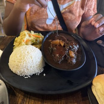 The Island Spot - Brown Stew Chicken - Caribbean Near Me - Carrollton, Texas The Island Spot - Brown Stew Chicken - Caribbean Near Me - Carrollton, Texas