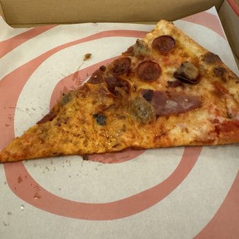 Mr Moto Pizza - The Hulk pizza slice with pepperoni, sausage, bacon, and ham. - Pizza Near Me - Orange, California