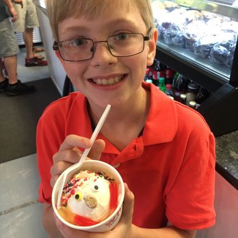 Whit's Frozen Custard - a boy holding a bowl of ice cream - Desserts Near Me - Marietta, Ohio Whit's Frozen Custard - a boy holding a bowl of ice cream - Desserts Near Me - Marietta, Ohio