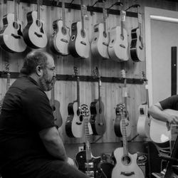 The Music Den - Taylor Guitar "Find Your Fit" Event August 2018 w/ Taylor Rep - talking with a customer