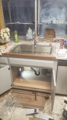 Kitchen Sink replacement - This remodel was done on an old kitchen that was in bad shape. I was hired to remove and install a new kitchen sink with all the trimmings, Faucet, garbage disposal, p-trap
and ex... once I seen the sink they supplied I informed them this sink wouldn't work for this application, a short time later he arrived
with a kitchen sink just right. I had to do alittle modification to the counter top , to make sink sit flush, in order to have tile overlay , lay level with surrounding tiles. Kitchen Sink replacement - This remodel was done on an old kitchen that was in bad shape. I was hired to remove and install a new kitchen sink with all the trimmings, Faucet, garbage disposal, p-trap
and ex... once I seen the sink they supplied I informed them this sink wouldn't work for this application, a short time later he arrived
with a kitchen sink just right. I had to do alittle modification to the counter top , to make sink sit flush, in order to have tile overlay , lay level with surrounding tiles.