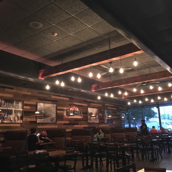 The Mill Steakhouse + Spirits - Cool lighting and the wood wall is a nice touch as well as the old photos - Sports Bars Near Me - Milton, Washington The Mill Steakhouse + Spirits - Cool lighting and the wood wall is a nice touch as well as the old photos - Sports Bars Near Me - Milton, Washington