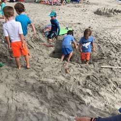 Sandcastle Tales - Play with sand in our store and then walk to the beach!