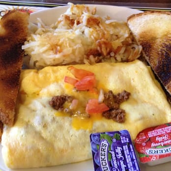 Suzie's Kitchen - Taco Omelet with seasoned beef, cheddar, sour cream and salsa - Breakfast & Brunch Near Me - Rosemount, Minnesota Suzie's Kitchen - Taco Omelet with seasoned beef, cheddar, sour cream and salsa - Breakfast & Brunch Near Me - Rosemount, Minnesota