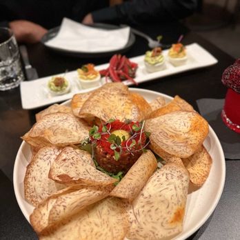Fermentation Lab - gochujang steak tartare with taro chips, arugula, quail egg, caviar - Cocktail Bars Near Me - San Francisco, California