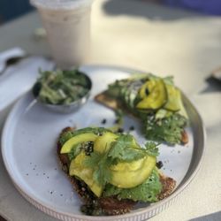 Pacific Pearl Cafe - Avocado toast with an iced chai