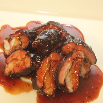 BBQ Masters - a plate of meat with sauce - Barbeque Near Me - Atlanta, Georgia BBQ Masters - a plate of meat with sauce - Barbeque Near Me - Atlanta, Georgia