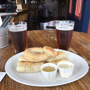 Angry Minnow Brewing - a plate of food and beer - Brewpubs Near Me - Hayward, Wisconsin
