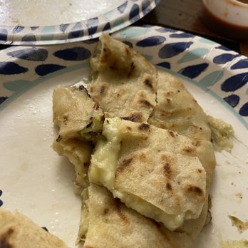 Rincon Sabroso Restaurant - Pupusas (cut up) - Mexican Near Me - Mountain View, California Rincon Sabroso Restaurant - Pupusas (cut up) - Mexican Near Me - Mountain View, California