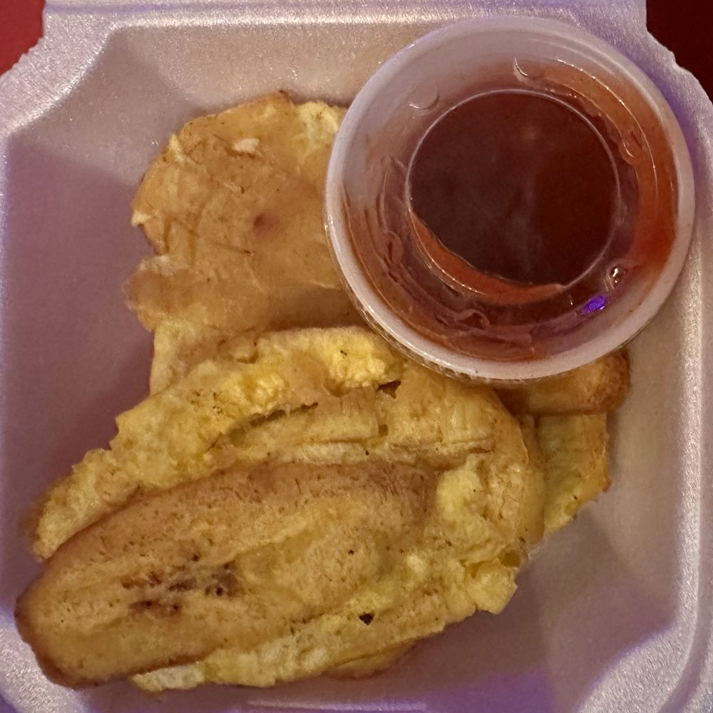 Go Jerk - Tostones with Spicy Jerk sauce on the side. - Caribbean Near Me - Miramar, Florida Go Jerk - Tostones with Spicy Jerk sauce on the side. - Caribbean Near Me - Miramar, Florida