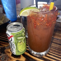 Michelada with pickle beer and chamoy straw Michelada with pickle beer and chamoy straw