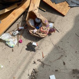 Trash from LGBuilder employees including beer cans which they drank on the job.