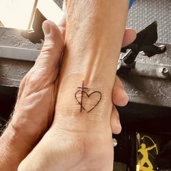 Wisemagic Tattoo - Manifesting faith & love