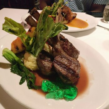 La Brochette Bistro Seafood and Grill - Grilled lamb chops served with mashed potatoes, grilled cantaloupe, red pepper, asparagus & leafy greens - French Near Me - Hollywood, Florida La Brochette Bistro Seafood and Grill - Grilled lamb chops served with mashed potatoes, grilled cantaloupe, red pepper, asparagus & leafy greens - French Near Me - Hollywood, Florida