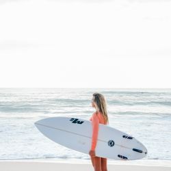 Surf with Vanessa Rivers - Learn to surf this week! Book your lesson at SurfLessonsWithVanessa.com