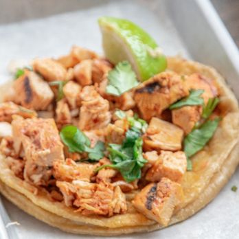 Rreal Tacos - Sugar Hill - a chicken taco on a tortilla - Tacos Near Me - Sugar Hill, Georgia Rreal Tacos - Sugar Hill - a chicken taco on a tortilla - Tacos Near Me - Sugar Hill, Georgia