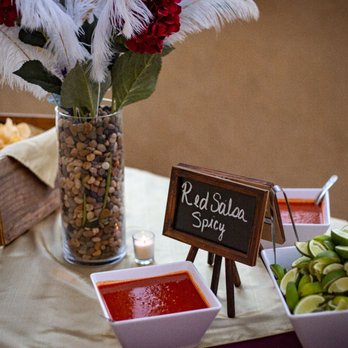 Big O's Tacos - She brought her own vase with white feathers and beautiful red flowers. She went above and beyond - Caterers Near Me Big O's Tacos - She brought her own vase with white feathers and beautiful red flowers. She went above and beyond - Caterers Near Me