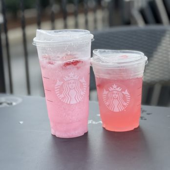 Starbucks - two cups of pink drink on a table - Coffee & Tea Near Me - Kitchener, Ontario