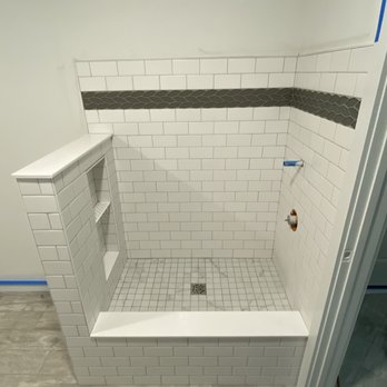 Ceramic Solutions - a shower with a tiled floor - Flooring Near Me Ceramic Solutions - a shower with a tiled floor - Flooring Near Me