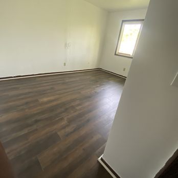 Wood Flooring Masters - This is an after picture after removing the dirty carpet from previous tenants. - Flooring Near Me Wood Flooring Masters - This is an after picture after removing the dirty carpet from previous tenants. - Flooring Near Me