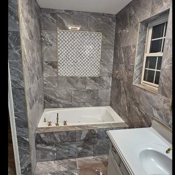 Marino Home Remodeling - a bathtub and sink - General Contractors Near Me Marino Home Remodeling - a bathtub and sink - General Contractors Near Me